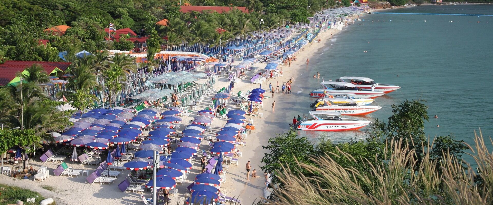 Pattaya’s tropical shoreline and skyline on a Pattaya Travel guide banner by Legend Travel Group.